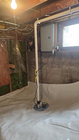 CleanSpace Crawl Space Encapsulation System - Installed across the floor and walls to create a continuous vapor barrier, helping to isolate the space from ground moisture and improve overall conditions
• TripleSafe Sump Pump System - Installed to actively collect and remove water, providing multiple levels of protection including backup capability during power outages