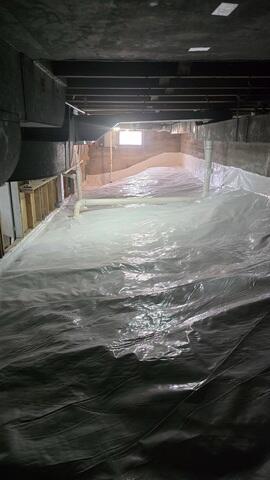 CleanSpace Crawl Space Encapsulation System - Installed across the floor and walls to create a continuous vapor barrier, helping to isolate the space from ground moisture and improve overall conditions