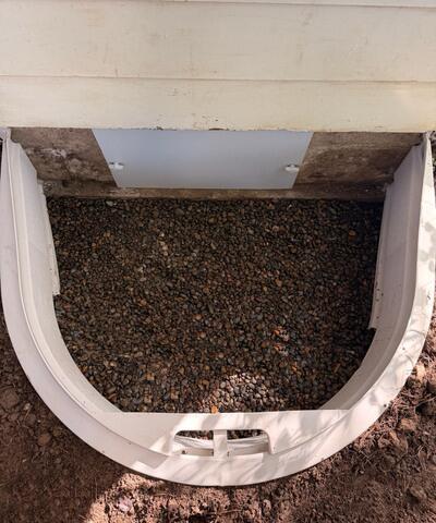 Our EverLast door and EverLast Access Well installed to create exterior access into the crawl space.