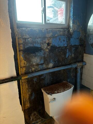 Severe water damage near the basement window in Capitol Heights, MD