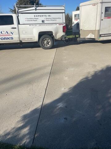 During: Our Foreman, Charlie, and his crew worked hard to secure all the products below the slabs.
