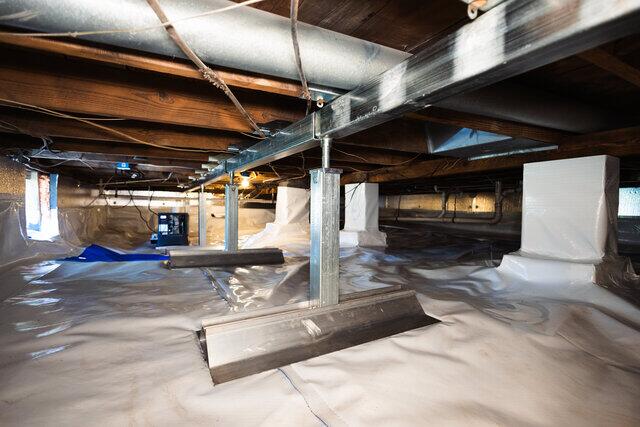 SmartJacks installed to stabilize and support sagging floors above.