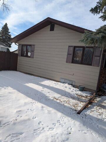 The exterior of the home before our crew installed the radon mitigation system