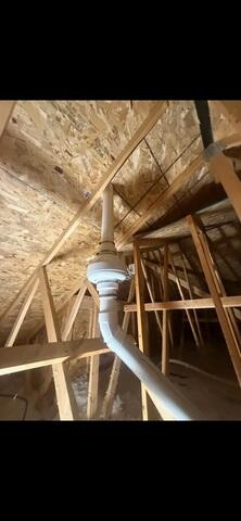During: Our Foreman, Jackson, worked hard to secure the radon fan in the attic.