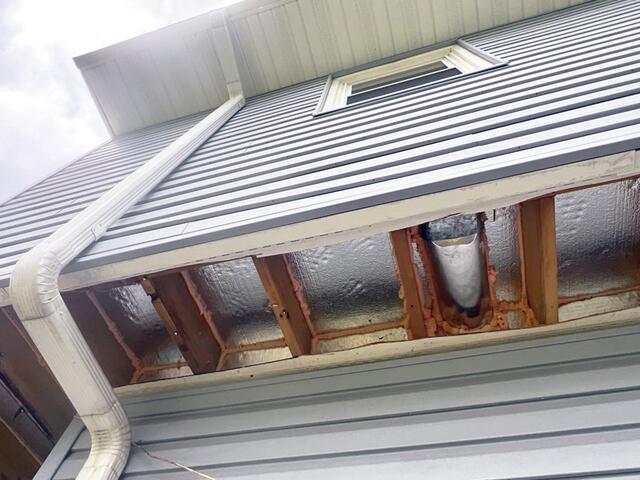 We removed the soffit panel and installed SilverGlo rigid foam boards with a radiant barrier to block cold air from entering, helping prevent frozen pipes and reduce drafts. Next, we sealed all gaps with ZypFoam to stop air leakage. Finally, we reinstalled the soffit panels.