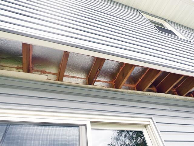 We removed the soffit panel and installed SilverGlo rigid foam boards with a radiant barrier to block cold air from entering, helping prevent frozen pipes and reduce drafts. Next, we sealed all gaps with ZypFoam to stop air leakage. Finally, we reinstalled the soffit panels.