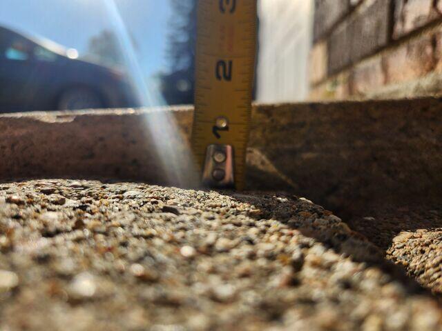 A close up of how far the slabs have sunken