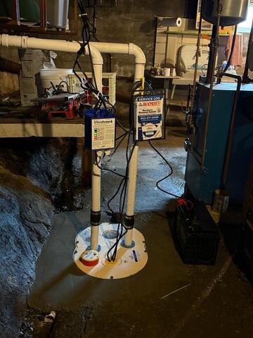 TripleSafe® Sump Pump System - Installed to handle high volumes of water with three levels of protection, including a battery backup to keep the system running during power outages