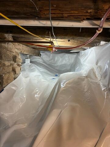 Drainage Matting System - Installed across the crawl space floor to create a separation layer and provide a more even surface
CleanSpace® Vapor Barrier System - Installed along the floor and walls to cover the exposed ground and help limit moisture from entering the space
SmartJack® Support System - Installed to provide additional structural support and help stabilize areas of the crawl space