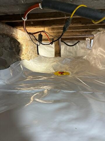 Drainage Matting System - Installed across the crawl space floor to create a separation layer and provide a more even surface
CleanSpace® Vapor Barrier System - Installed along the floor and walls to cover the exposed ground and help limit moisture from entering the space
SmartDrain® System - Installed to provide a simple way to monitor for any water presence beneath the encapsulation system