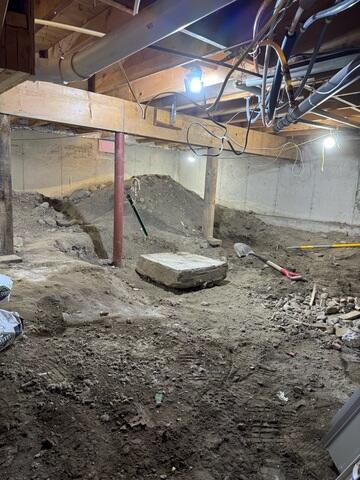 A crawl space in East Burke, Vermont, was experiencing ongoing moisture issues due to exposed earth and inadequate sealing. In addition, sections of the floor above showed signs of insufficient support, raising concerns about long-term structural stability.