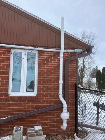 After: The homeowner was delighted to know the Radon Mitigation System was properly secured.