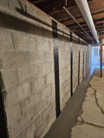 CarbonArmor wall straps to reinforce and stabilize the foundation wall