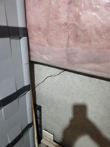 Before: Our Design Specialist, Dylan, noted the walls were suffering from cracking and recommended stabilizing them.