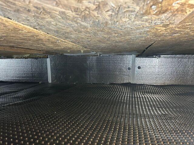CleanSpace Drainage Matting installed to improve drainage beneath the system.