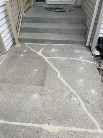 During: Our Foreman, Charlie, and his crew worked hard to secure the products below the sinking slabs.