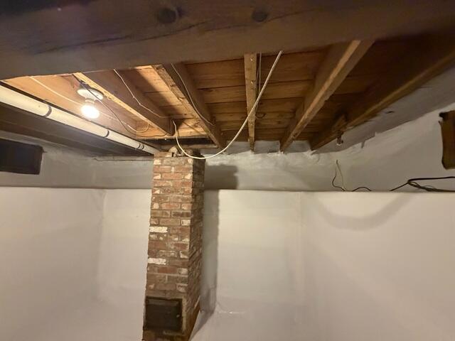 The crawl space transformation is complete with the addition of closed-cell spray foam.