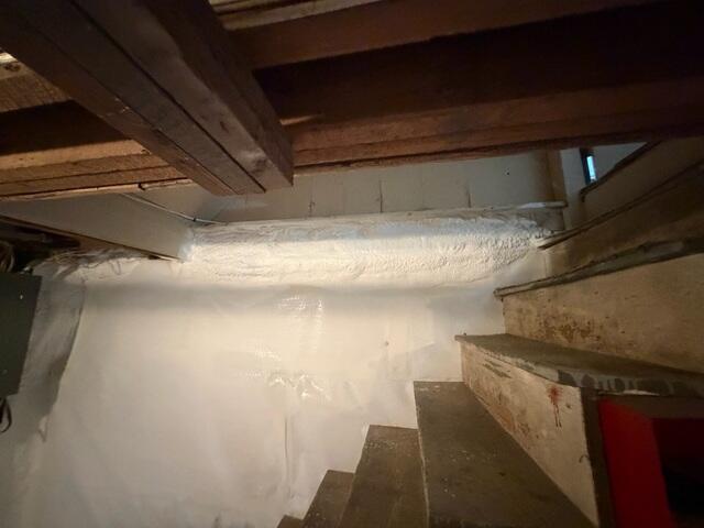 Closed-cell spray foam insulation along the rim joists and upper foundation areas
Sealed transition between the CleanSpace system and spray foam insulation
Moisture and air sealing system designed to help create a cleaner and more controlled basement environment