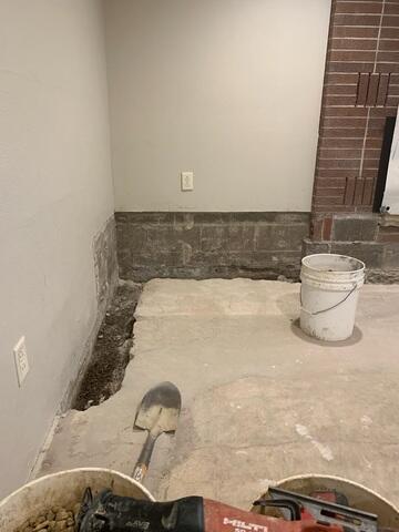 During: Our Foreman, Luis, and his crew worked hard to secure all the products throughout the basement.