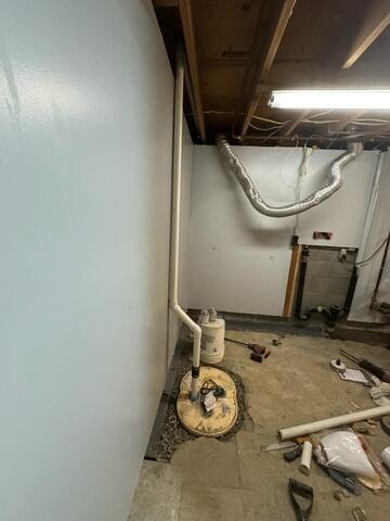 During: Our Foreman, Kingsley, and his crew worked hard to secure all the products in the basement.