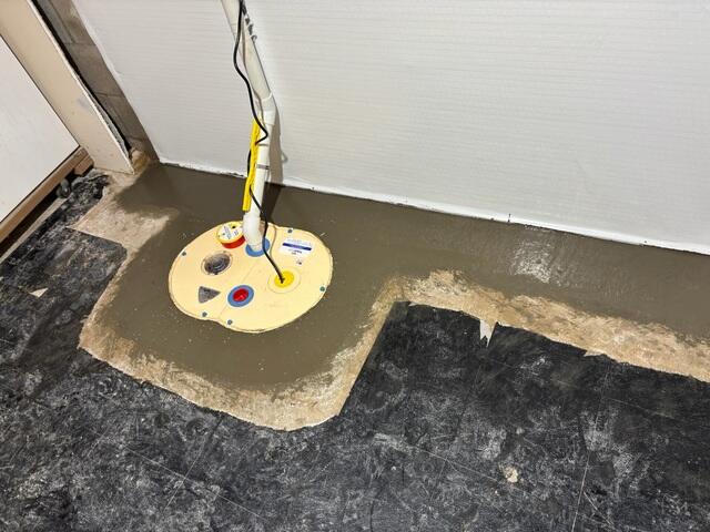 After our crew installed our waterproofing systems that flooring is restored