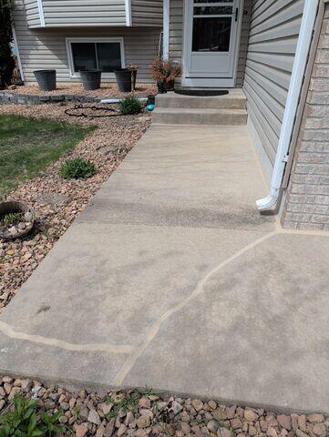 After the crew lifted the slabs and sealed the joints and cracks