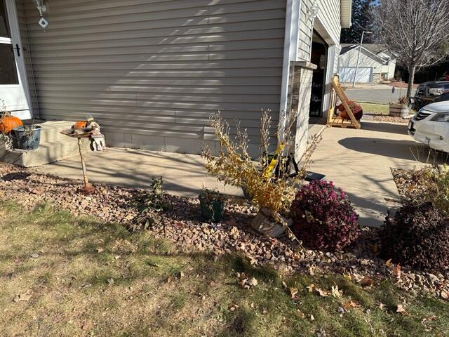 The concrete walkway and driveway began sinking causing the areas to become trip hazards