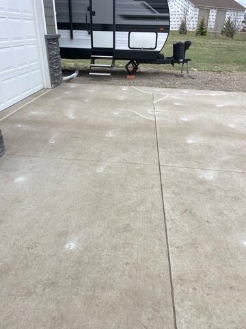 During: Our Foreman, Charlie, and his crew successfully lifted and leveled the sidewalk back to its original position.