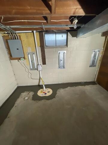 Post-Install 2: GeoLocks connected and tightened. WaterGuard and SuperSump has been covered by a fresh layer of concrete to hold it in place.