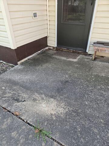Before: Our Design Specialist recommended lifting and leveling the sidewalk back to its original position.