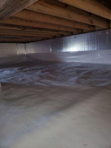 We sealed the crawl space walls with SilverGlo insulation panels and our durable plastic CleanSpace liner.