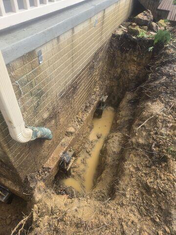 Our crew installed helical piers in stable soils beneath the home. These support the weight of the foundation and eliminate settlement.