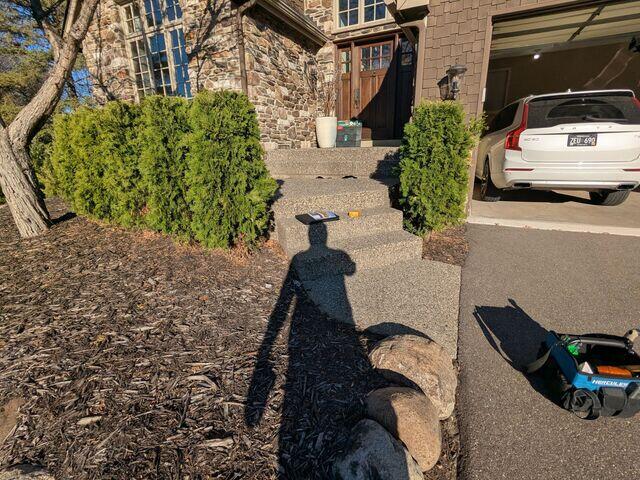 The front steps where there were signs of significant concrete sinking