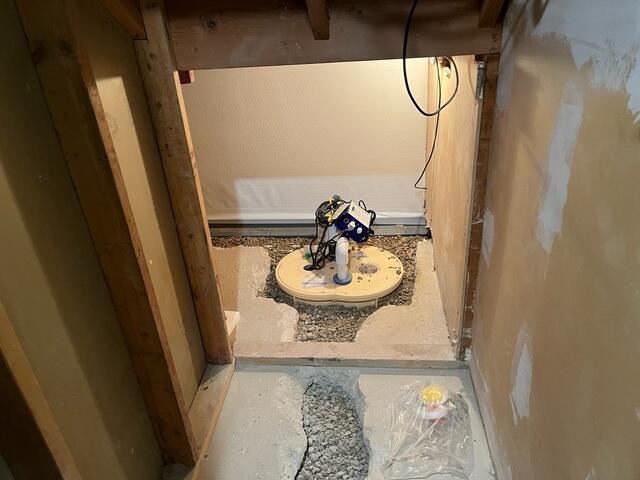 During: Our Foreman, Jesus, and his crew worked hard to secure all the products in the basement.