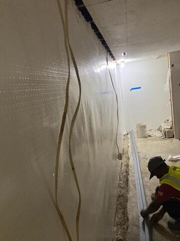 During: Our Foreman, Emmanuel, and his crew recommended securing several waterproofing products throughout the basement.