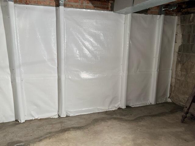 Foundation repair and Waterproofing completed with Cleanspace, powerbrace, and waterguard system