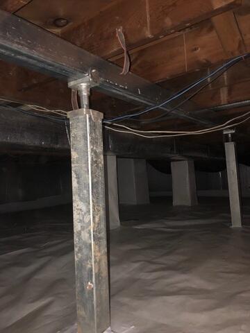 Crawl Space supported with Smart Jacks and Supplemental beams. Crawl Space is also encapsulated.