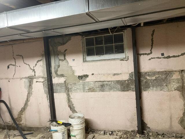 Before: The Design Specialist recommended securing several waterproofing products in the basement.