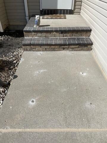 During: Our Foreman, Charlie, and his crew worked hard to secure all the concrete lifting products throughout the struggling walkway.