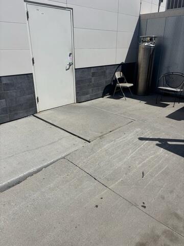 Before: Our Design Specialist, Jackson, recommended installing PolyLevel and NexusPro throughout the damaged concrete.