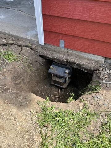 During: Our Foreman, Charlie, and his crew secured several products throughout the damaged concrete floor.
