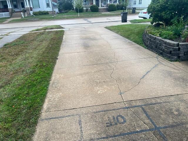 During: Our Foreman, Sam, and his crew successfully secured all the products below the sinking driveway.