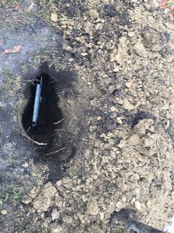 The earth anchor placed in and connected to the interior wall plate