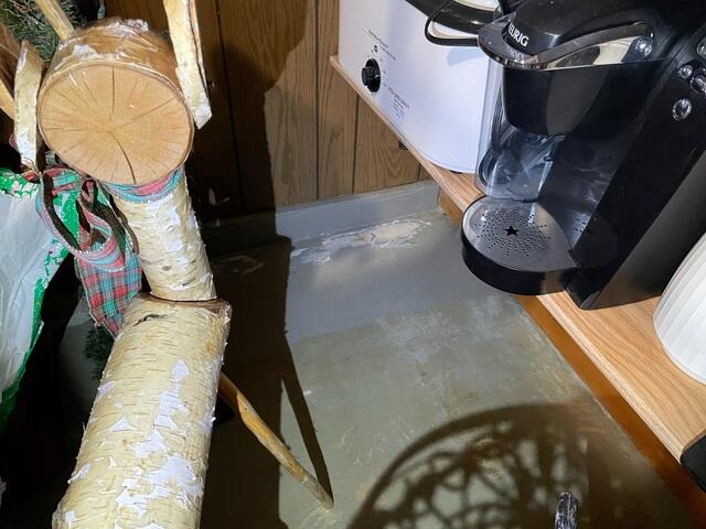 Water stains along the basement floor