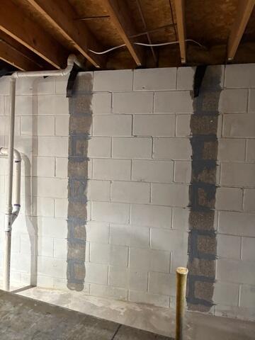The epoxy had been installed where the fiber straps would be placed on
