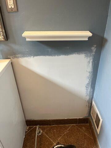 Drywall Doctor repaired the wall and got it smooth, ready for paint.