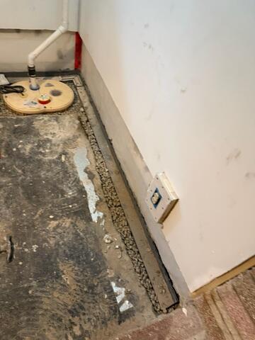 During: Our Foreman, Kingsley, and his crew worked hard to secure all the products throughout the basement.