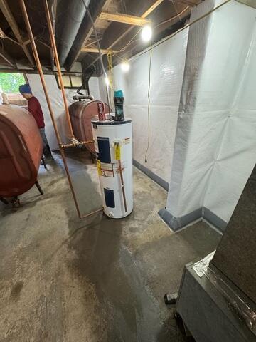 The CleanSpace Wall System was installed along the basement walls to help create a cleaner, brighter surface while working with the waterproofing system. When water enters through the foundation wall, CleanSpace helps direct it down into the drainage system rather than allowing it to spread across the basement floor or continue staining the wall surface.
Interior Basement Drainage System
The interior drainage system was installed along the basement perimeter to collect water at the base of the foundation wall. Once water enters the drainage system, it is directed to the sump pump system so it can be removed from the basement before reaching the main floor.