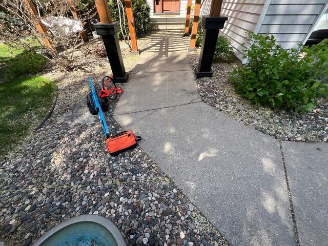 The walkway before it was lifted and leveled to restore safety