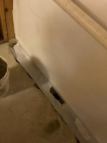 During: Our Foreman, Emmanuel, and his crew worked hard to secure all the products throughout the basement.